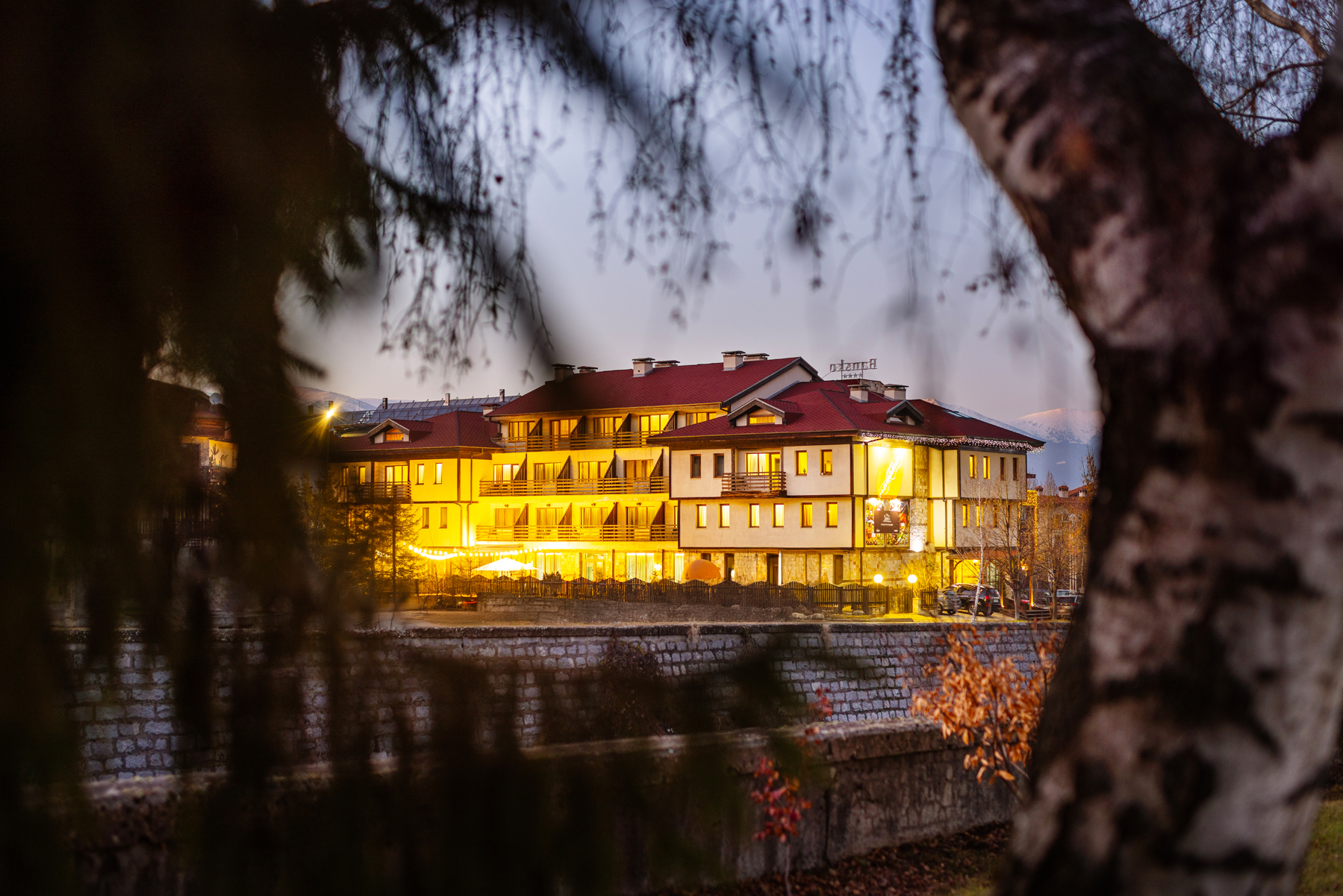 Coworking Bansko building exterior at dusk